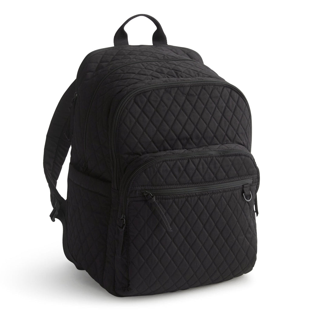 Black quilted backpack on a white background