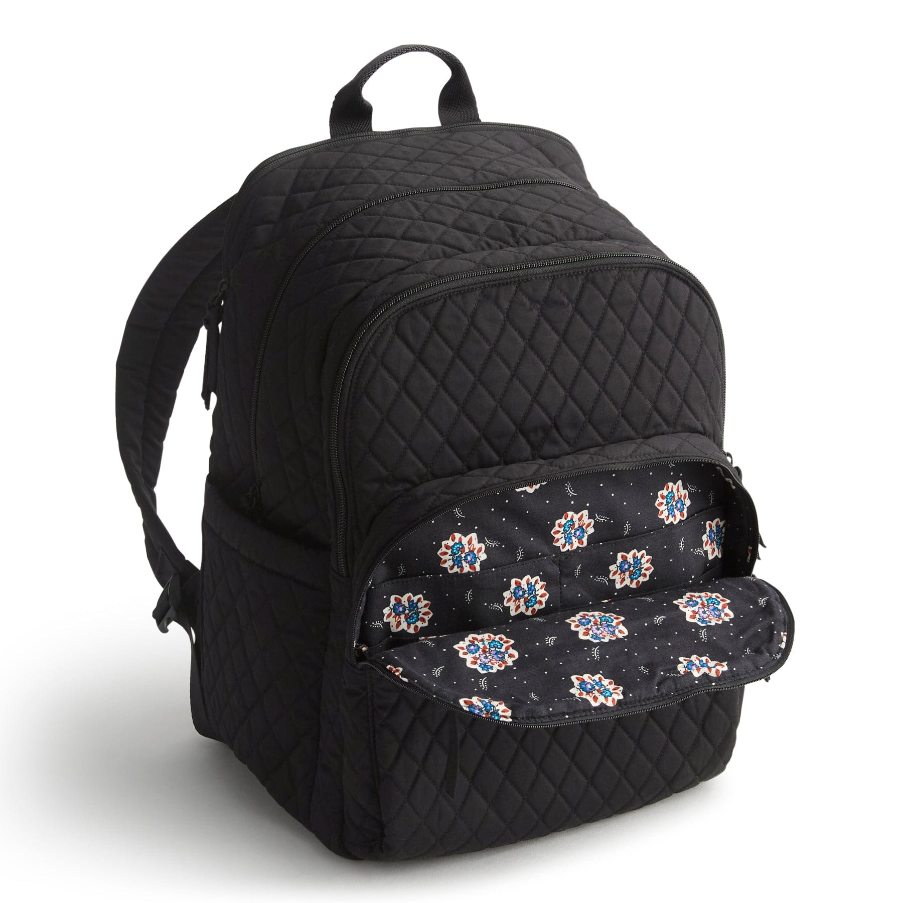 Black quilted backpack with floral pattern on a white background