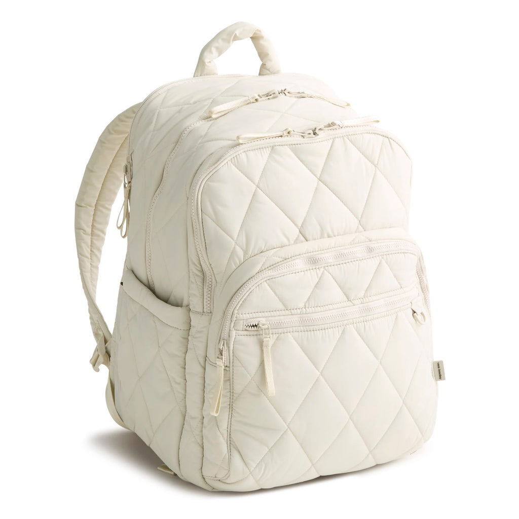 Quilted white backpack on a white background