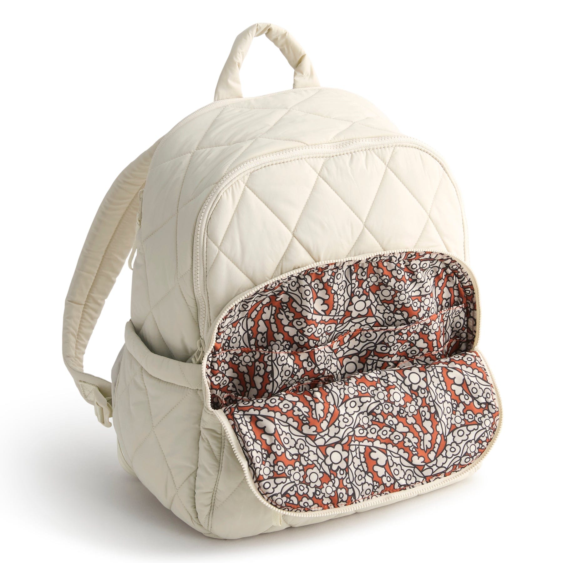 Quilted beige backpack with a patterned interior pocket on a white background