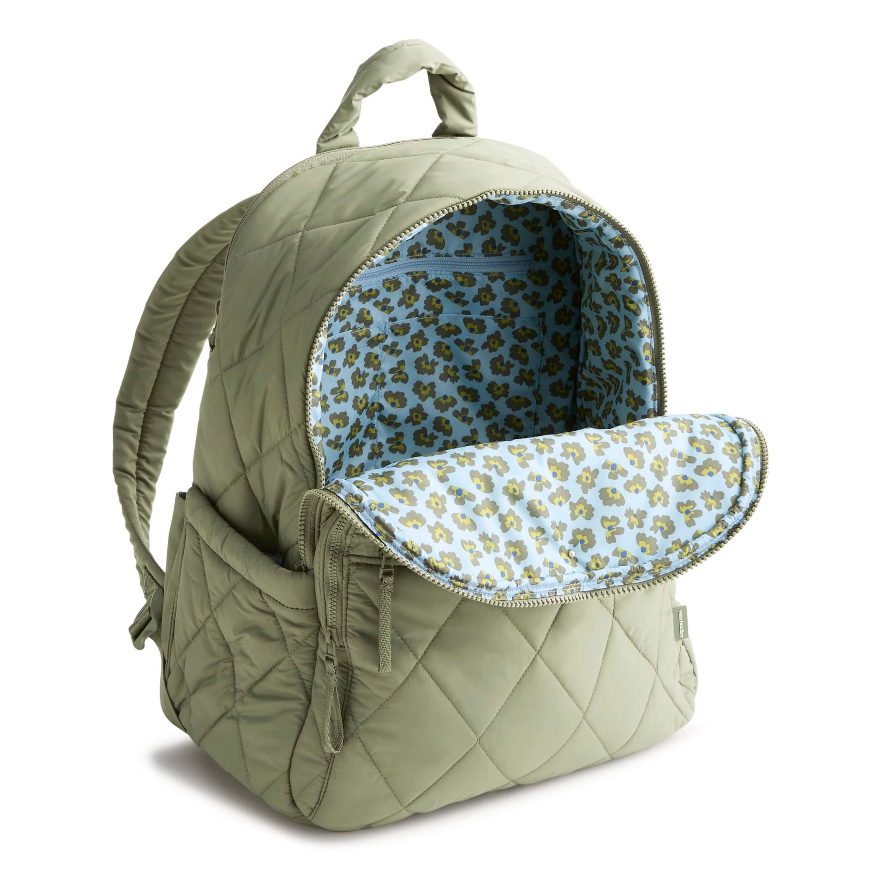 Green quilted backpack with floral interior on a white background
