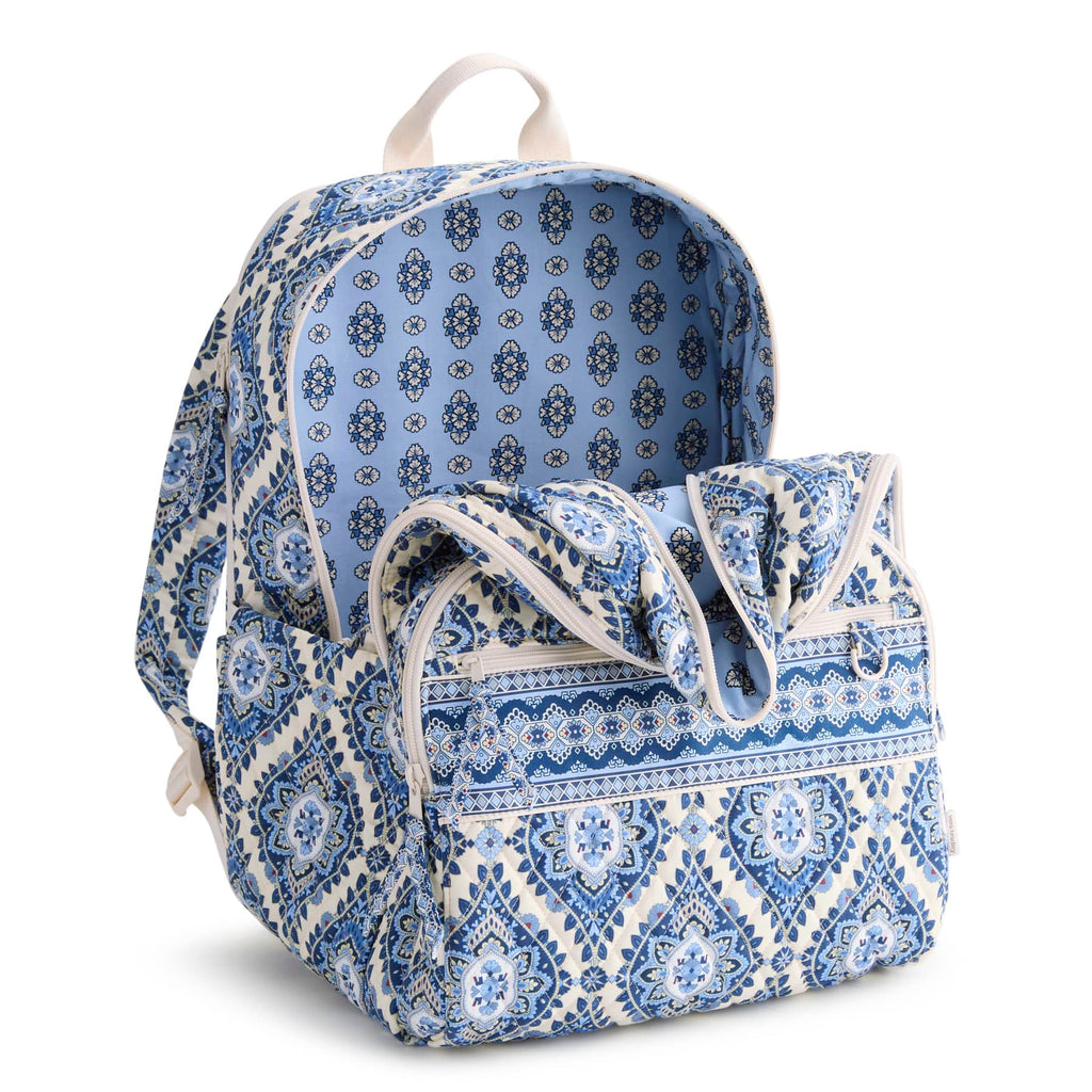 Blue and white patterned backpack with matching pouch on a white background