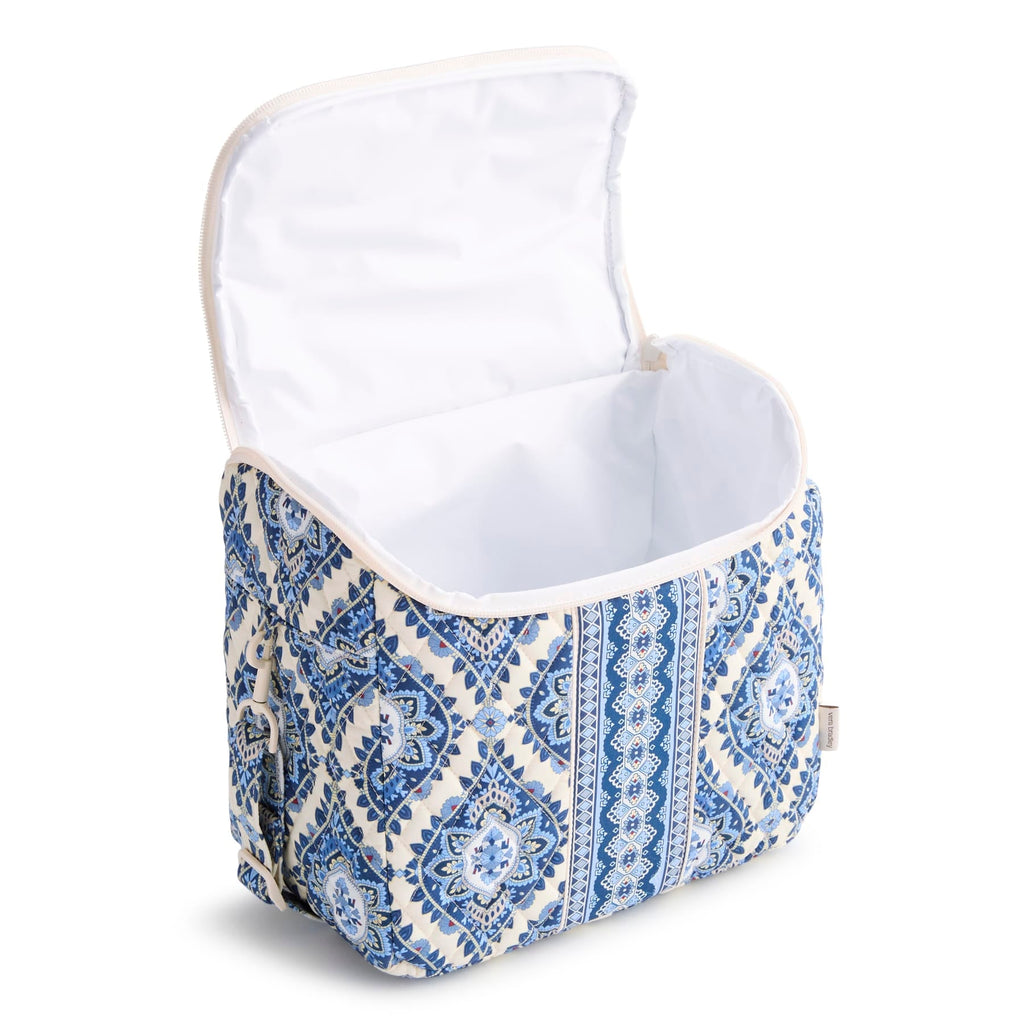Chair with a blue and white patterned cover on a white background