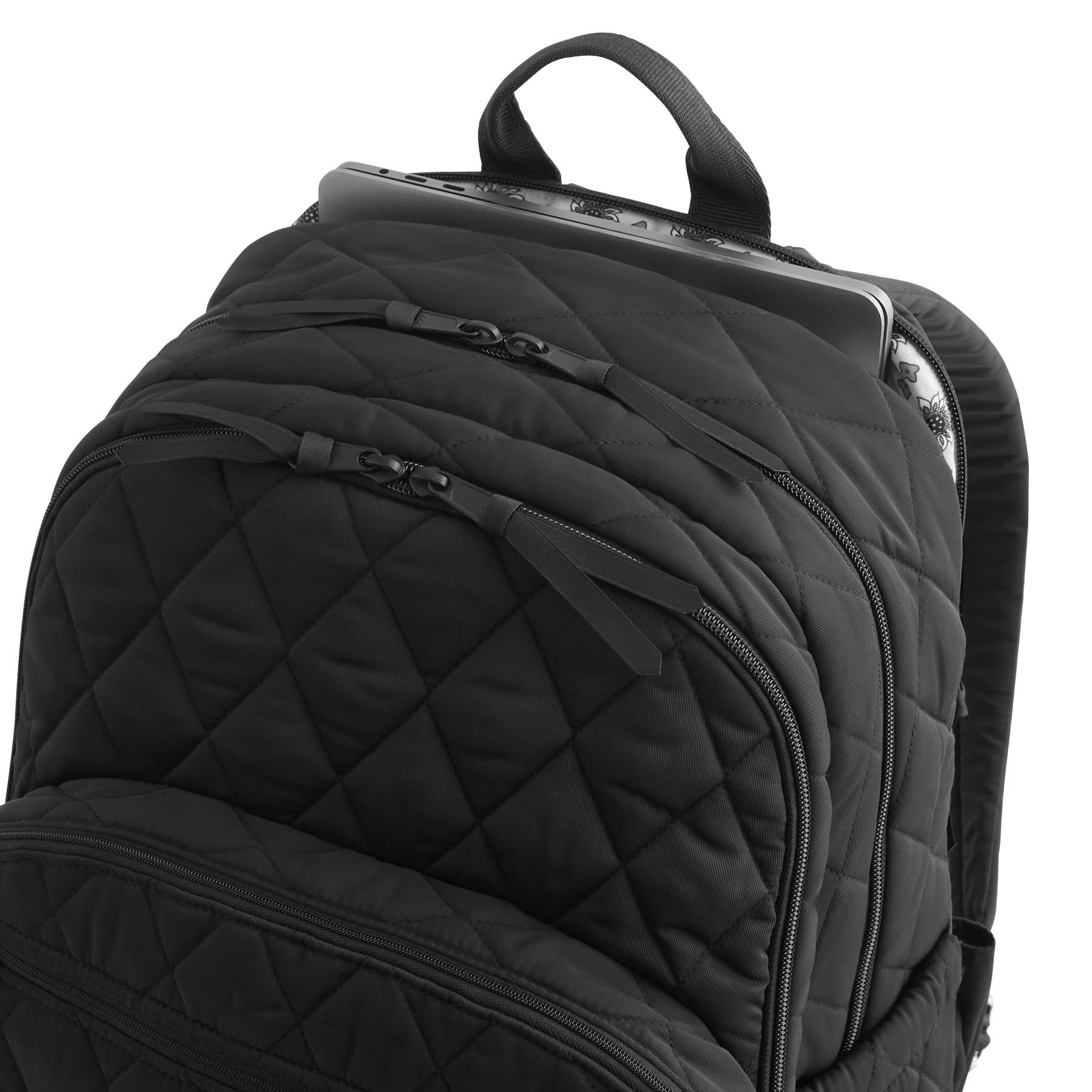 Black quilted backpack on a white background
