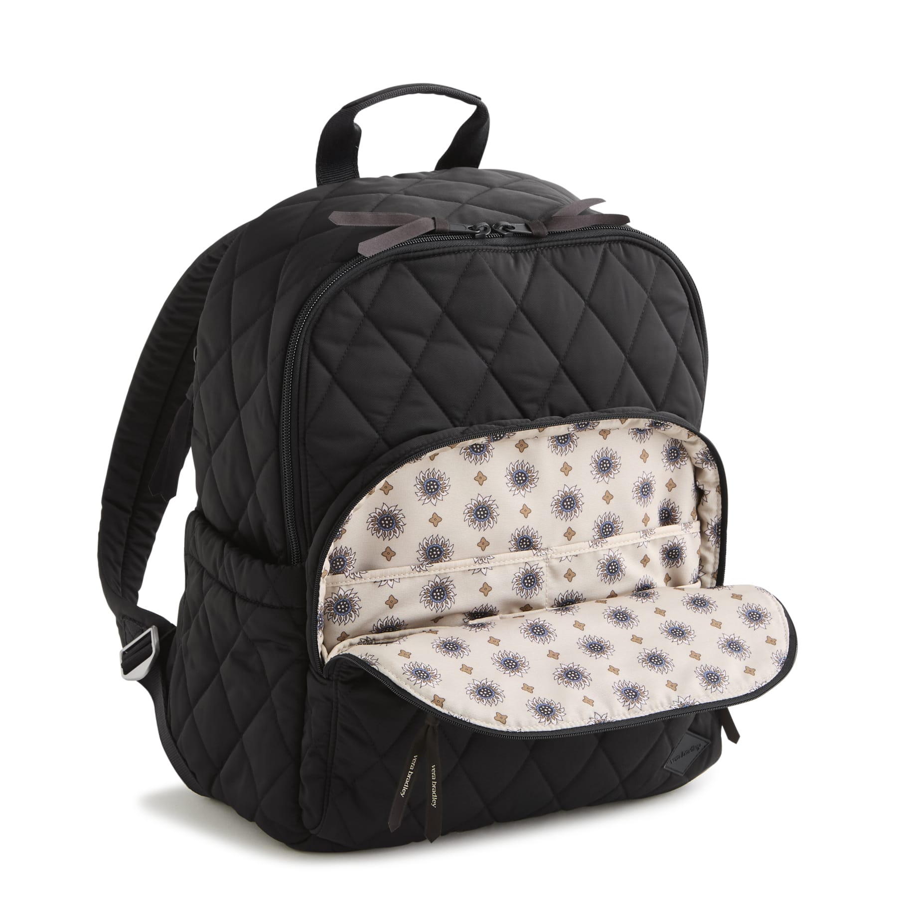 Black quilted backpack with a patterned interior on a white background