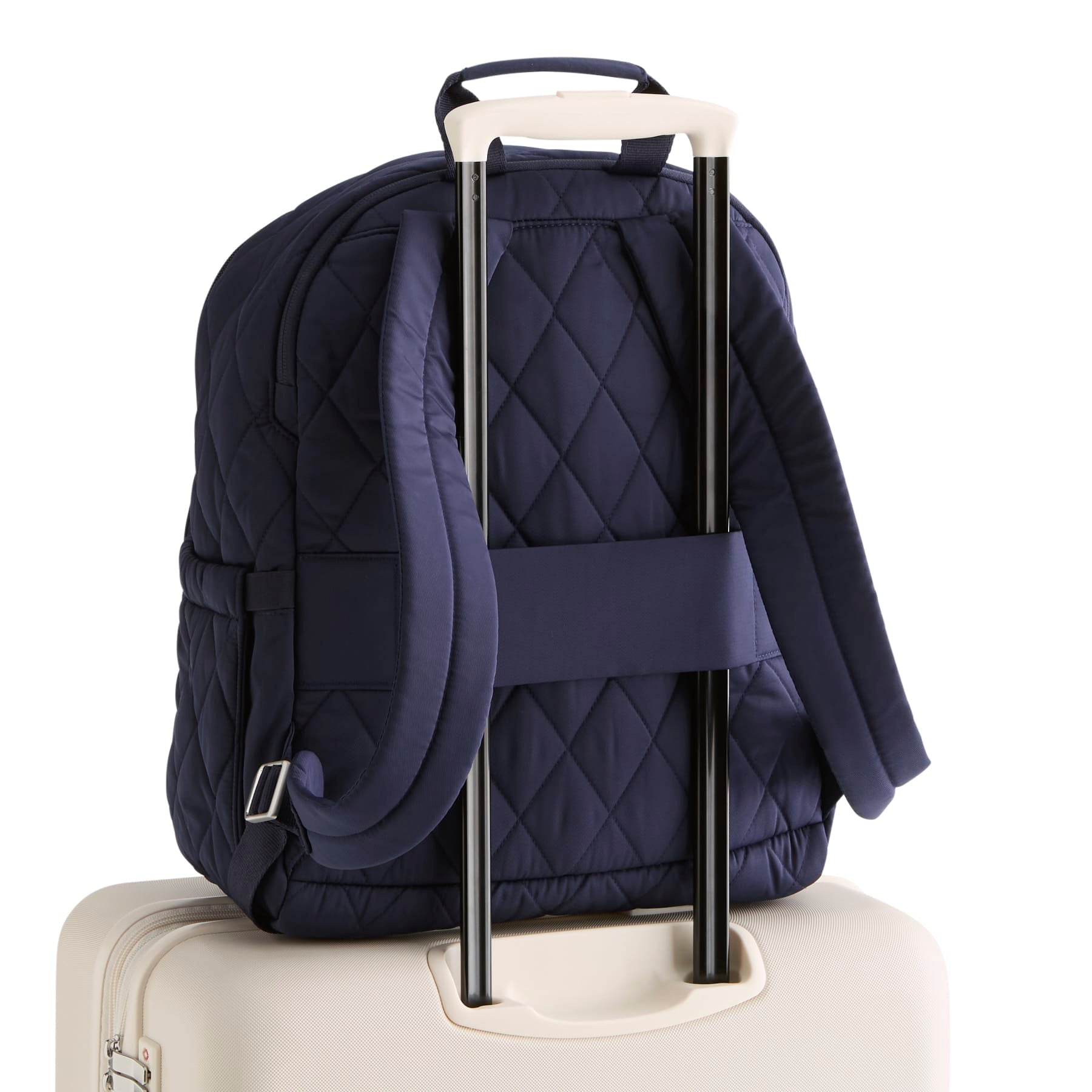 Navy quilted backpack on a white background