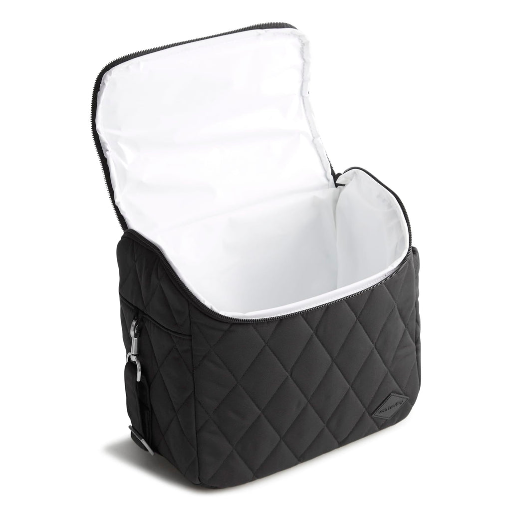 Black quilted diaper bag with white interior on a white background