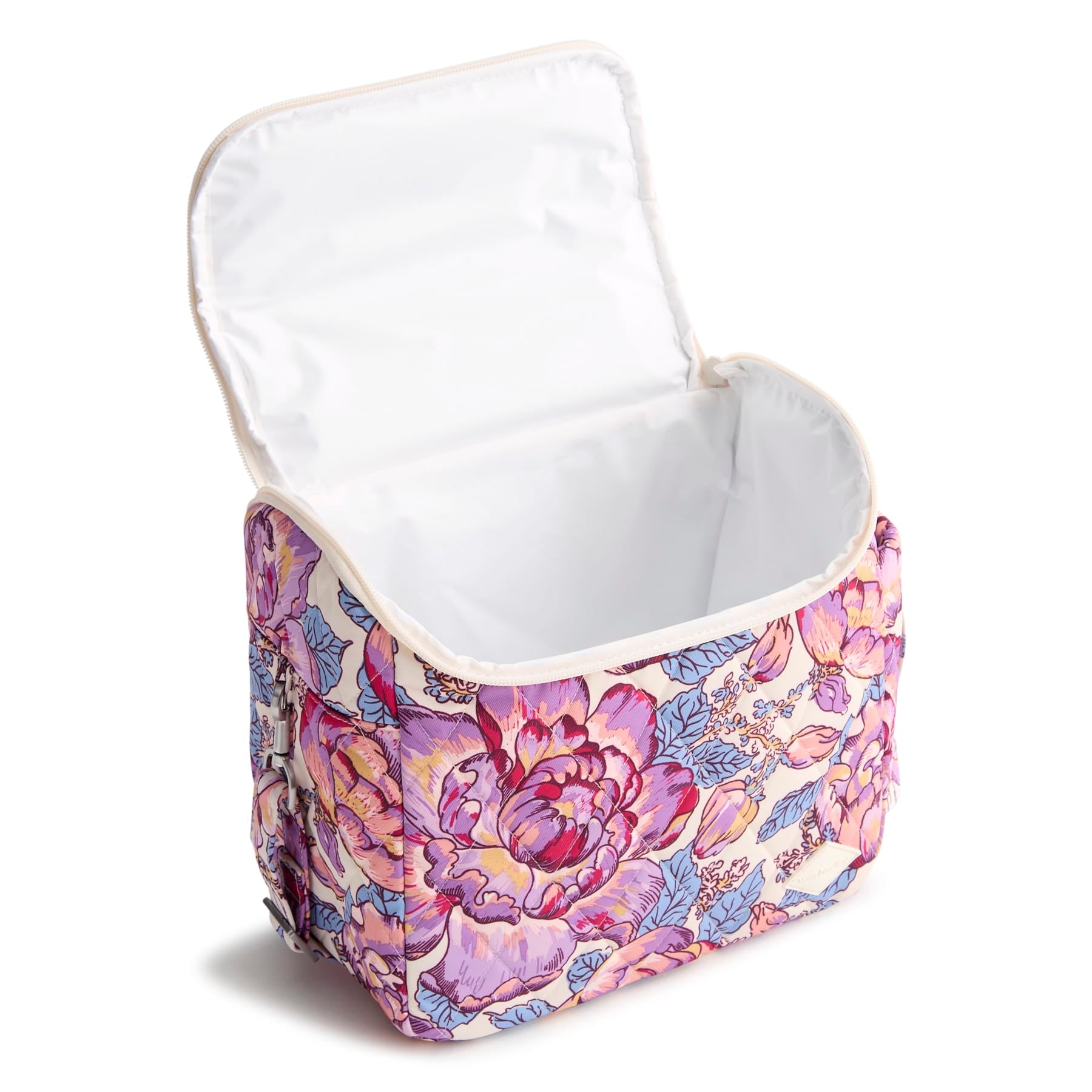 Floral-patterned storage basket with a white interior on a white background