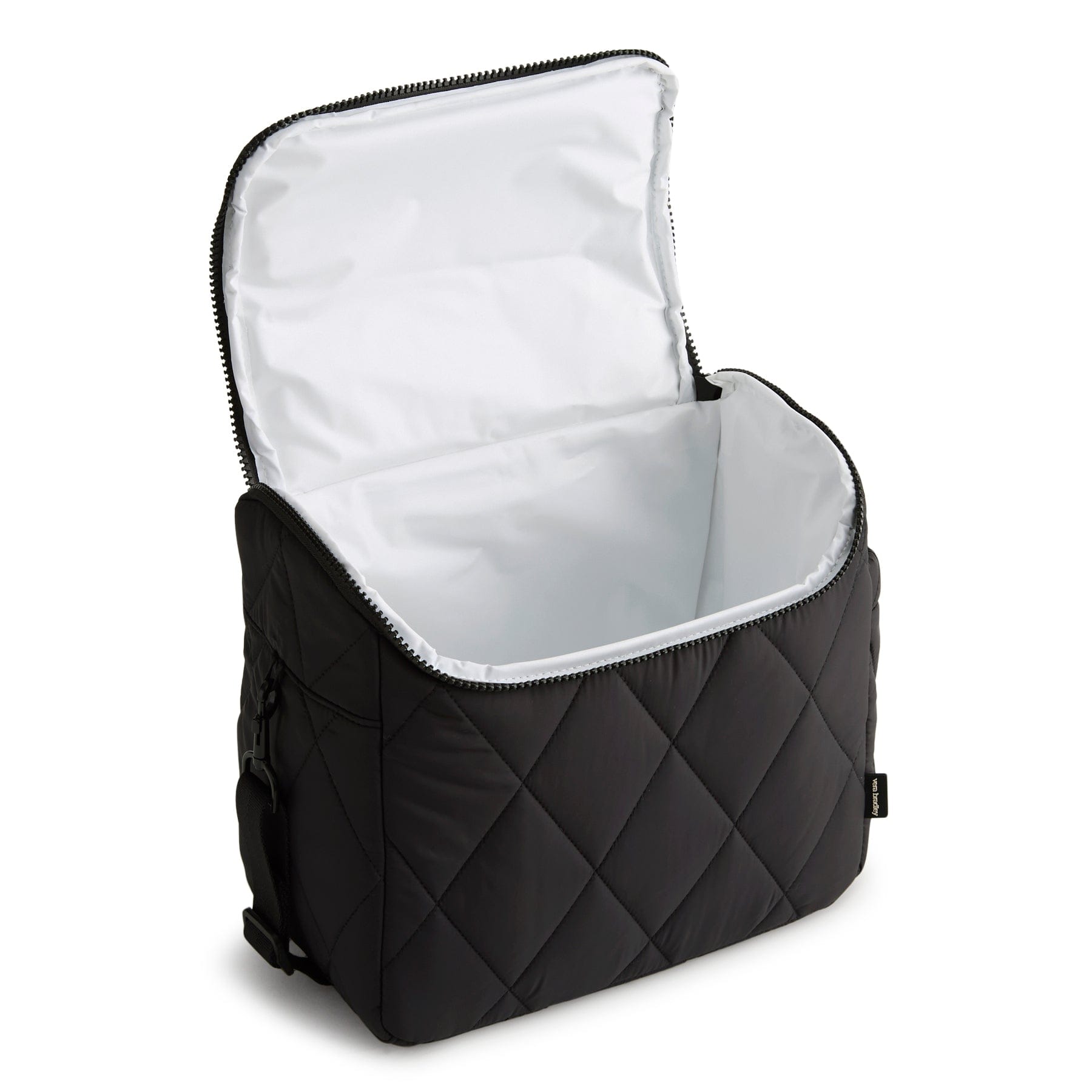 Black quilted backpack with open lid on a white background
