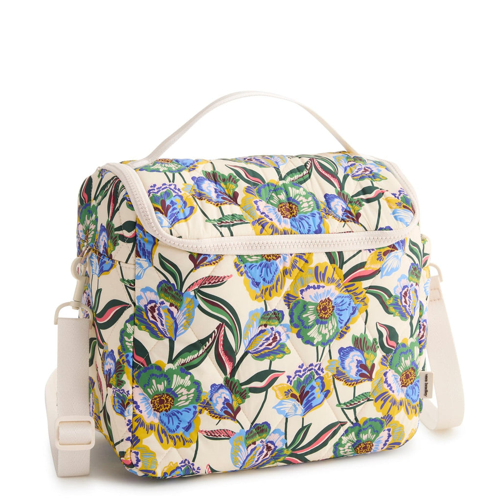 Floral-patterned bag with a white strap on a white background