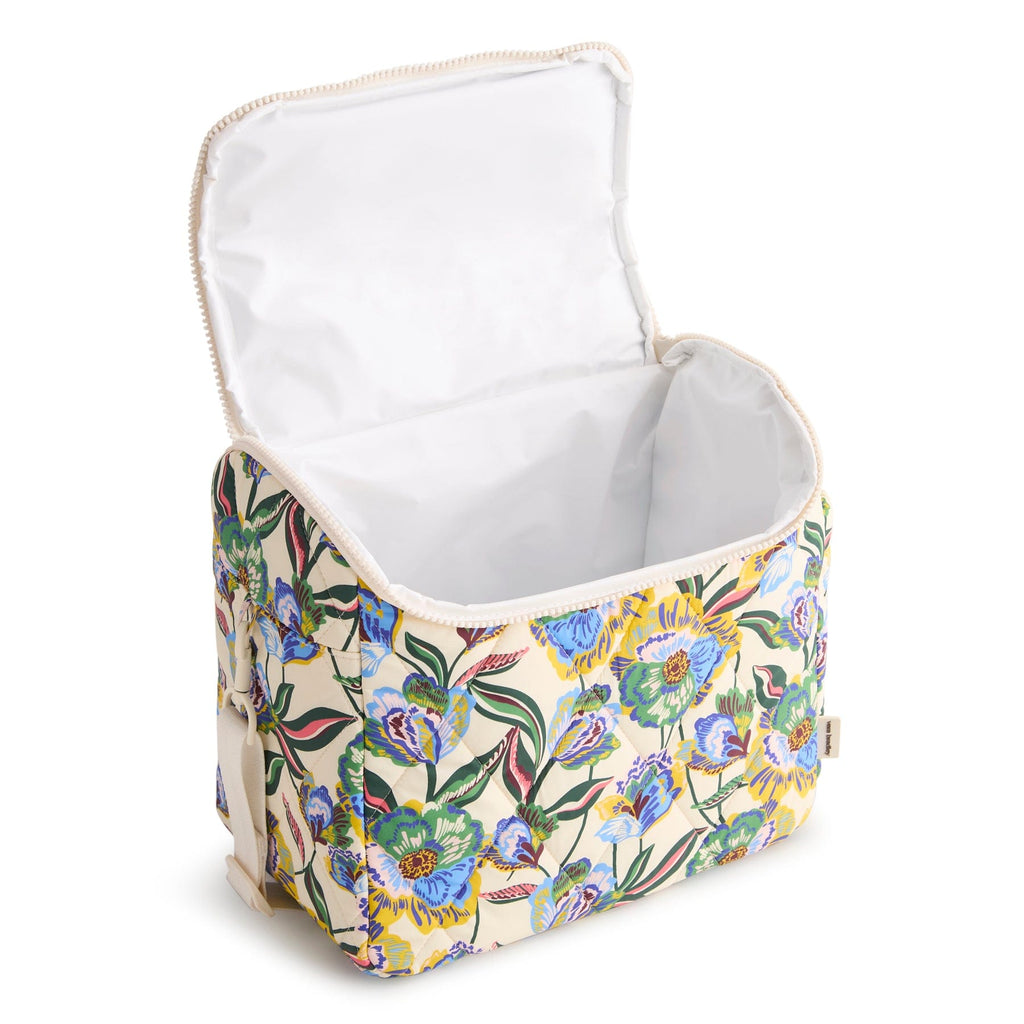 Floral-patterned laundry basket with open lid on a white background