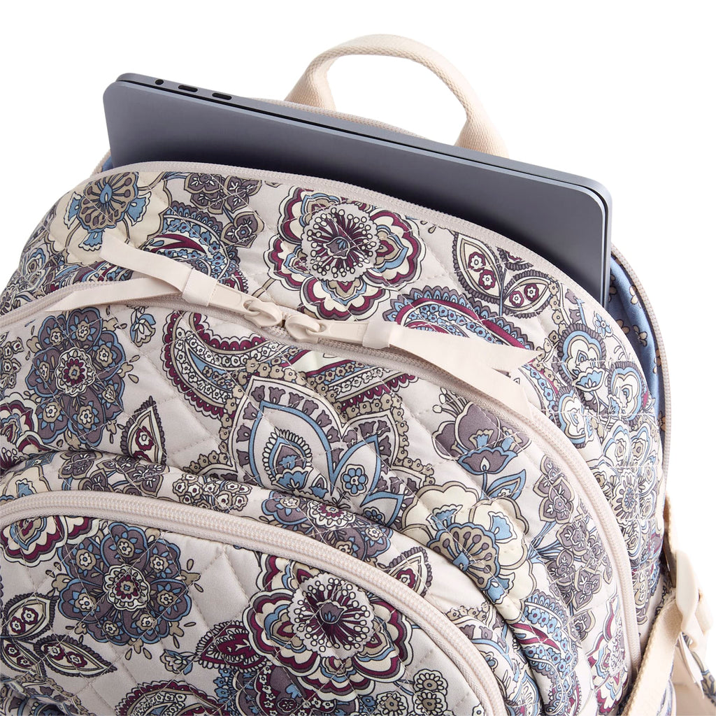 Patterned backpack with a laptop compartment on a white background